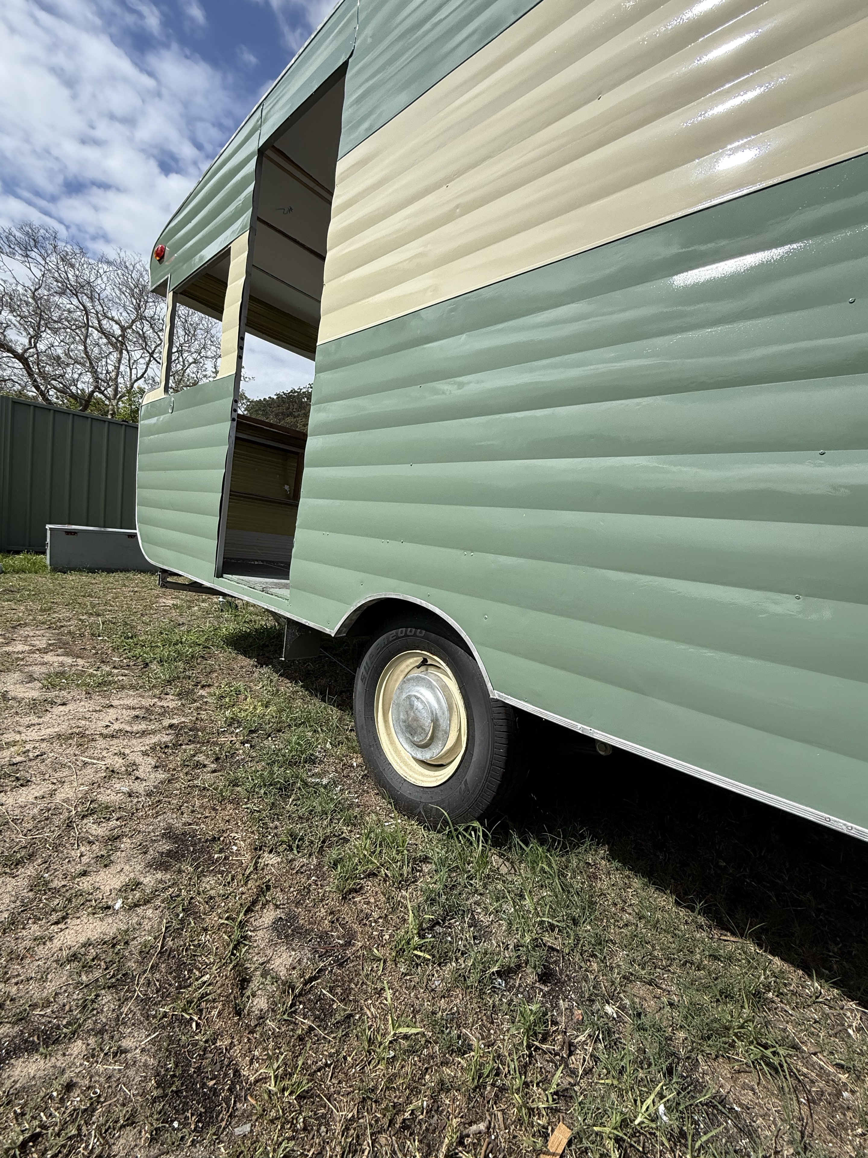 Sage-green and cream panels on our caravan during restoration.